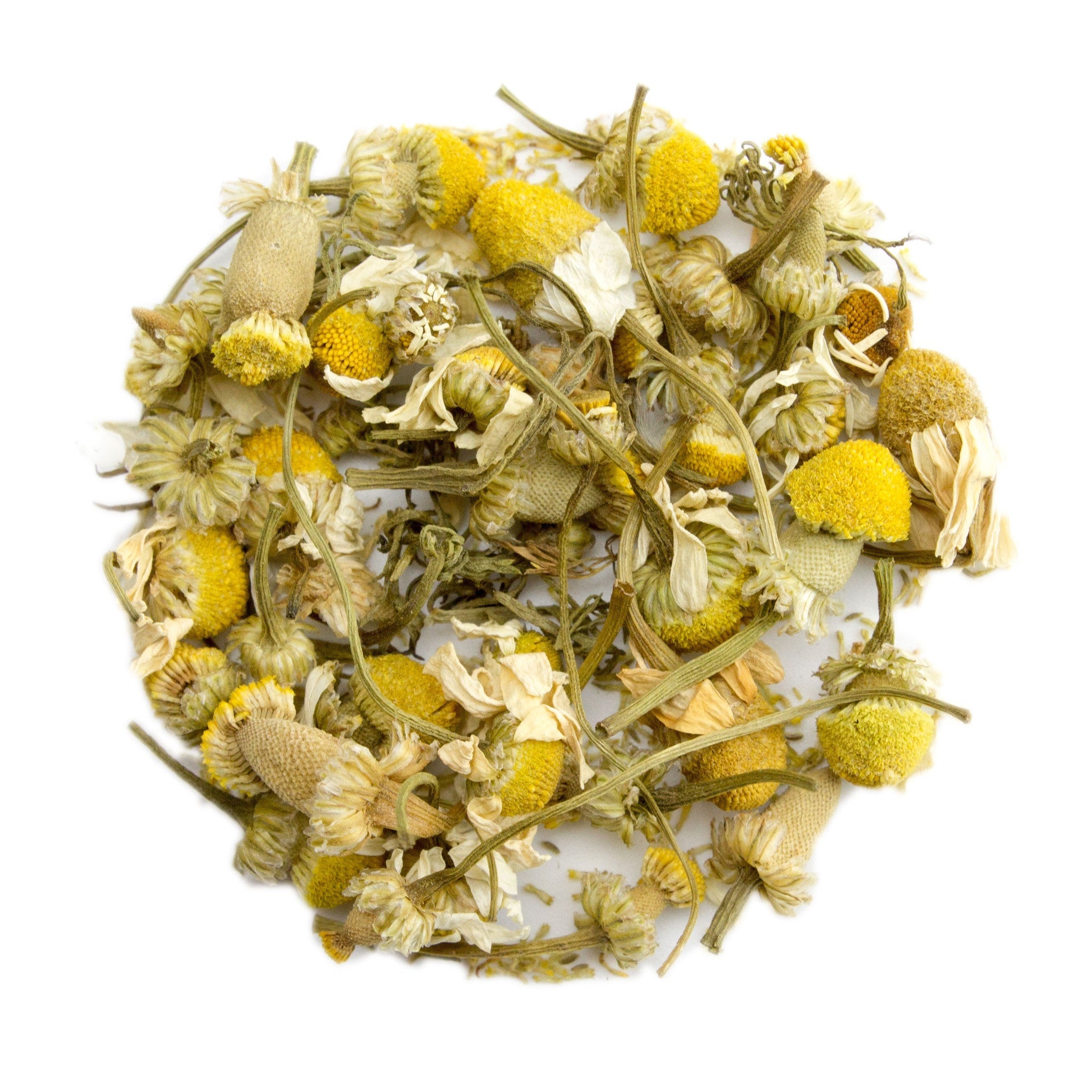 A pile of dried chamomile flowers with yellow centers pale white petals and slender green stems for herbal use