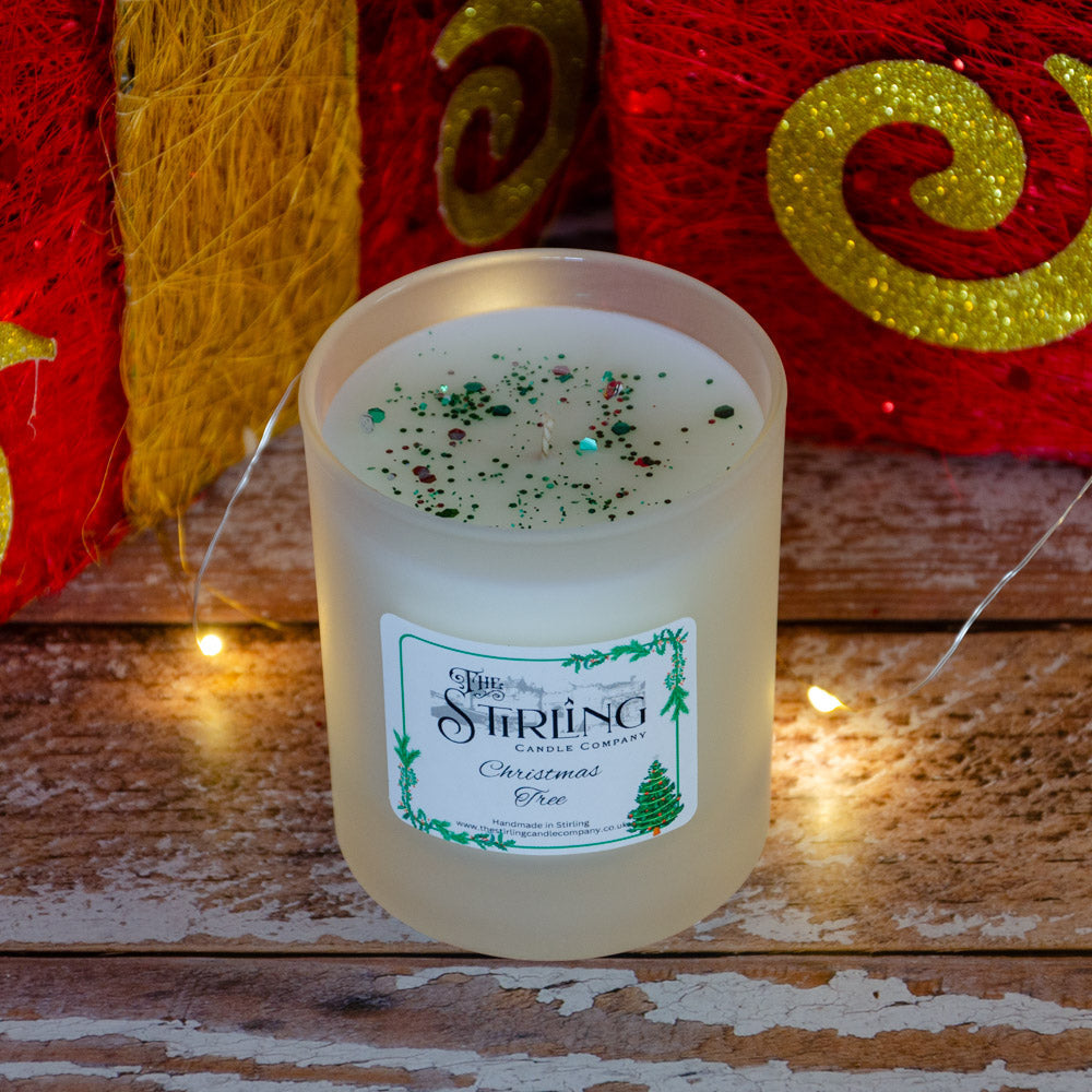 Christmas Tree medium candle in frosted jar with green glitter by Stirling