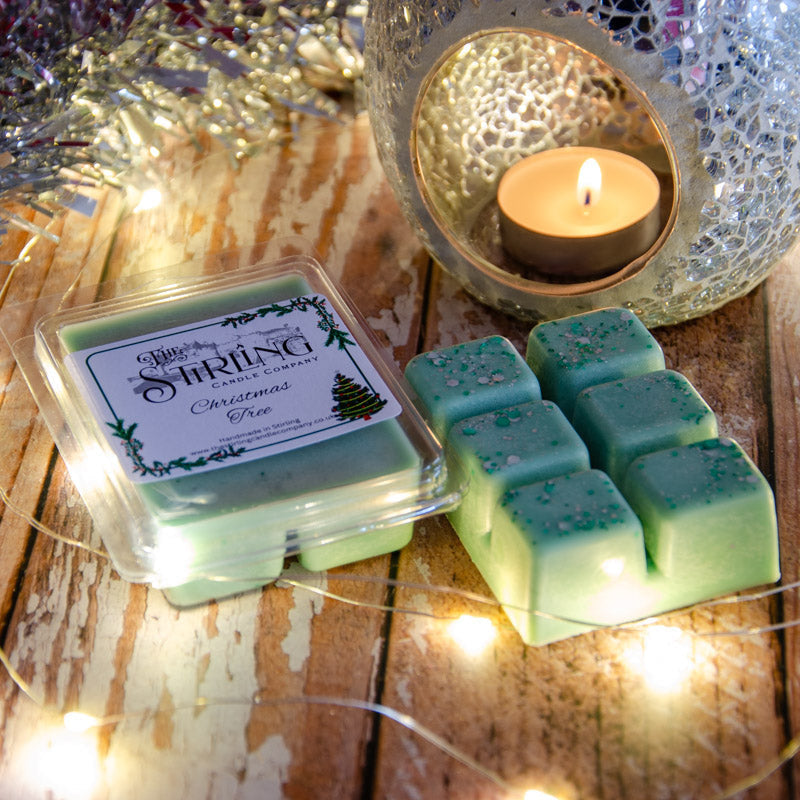 Christmas Tree wax melt clamshell with light green glittery square melts