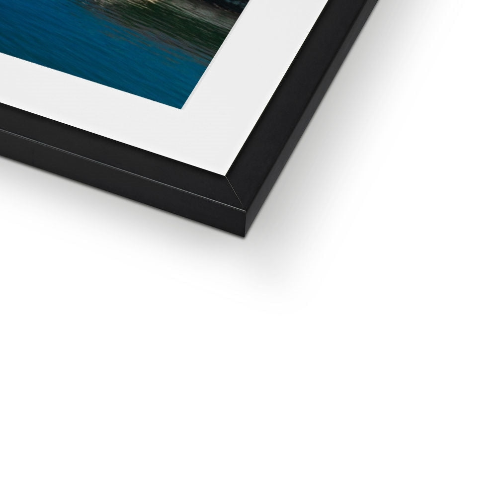 Black matte frame with white mat and blue Cloch Lighthouse photo