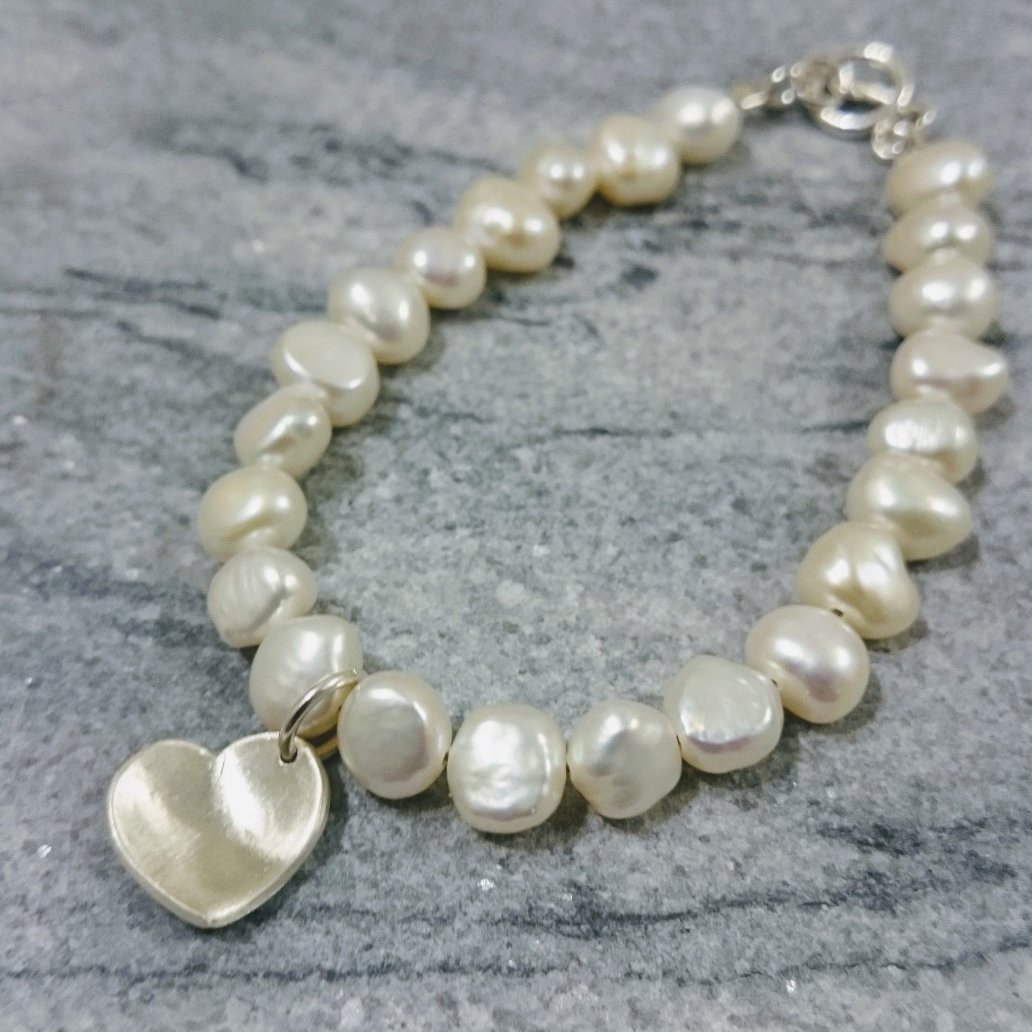 Cream pearl heart bracelet with lustrous freshwater pearls by Lindsay Mcdowall Jewellery