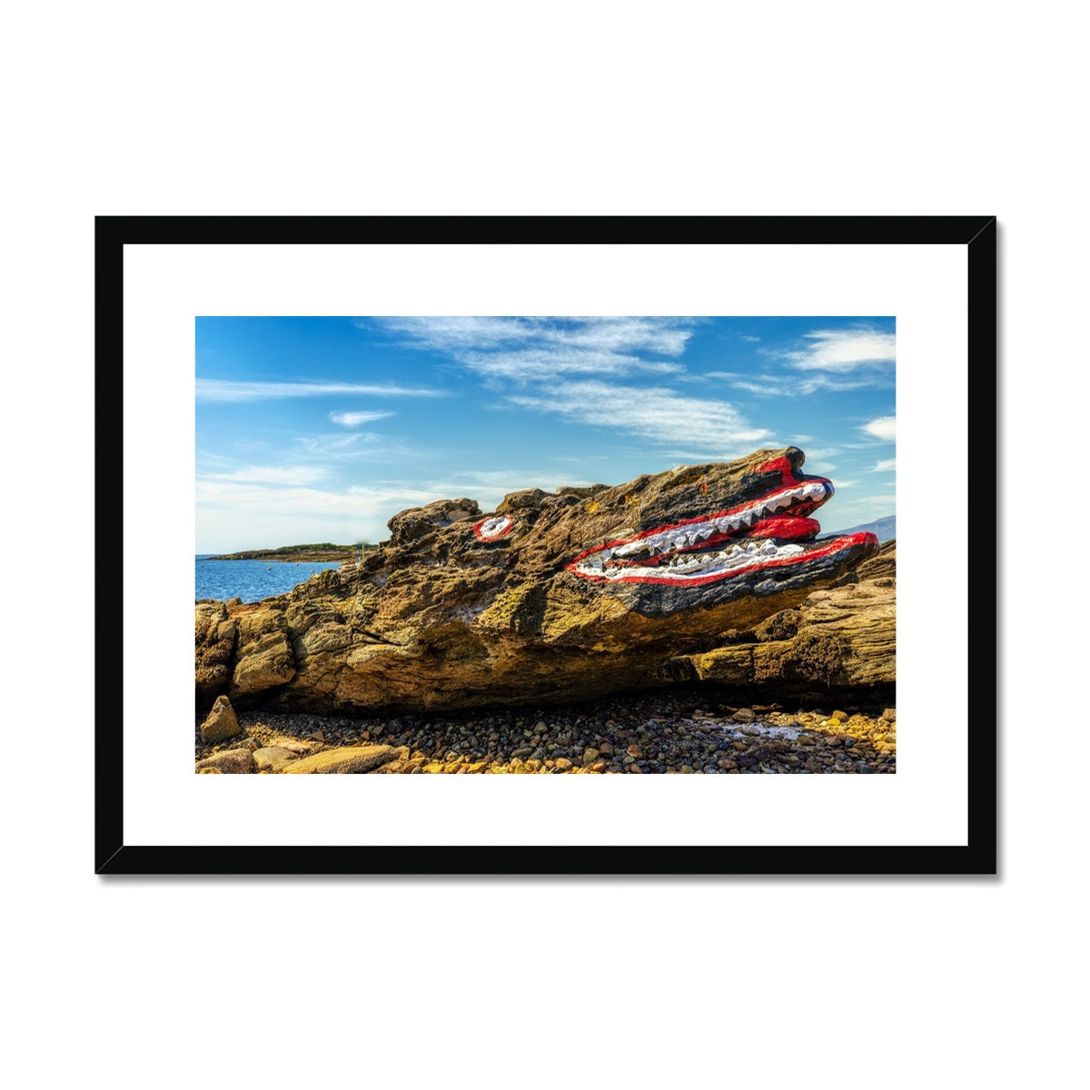 Red and white striped surfboard with black fins on rocky beach, Crocodile Rock Millport print