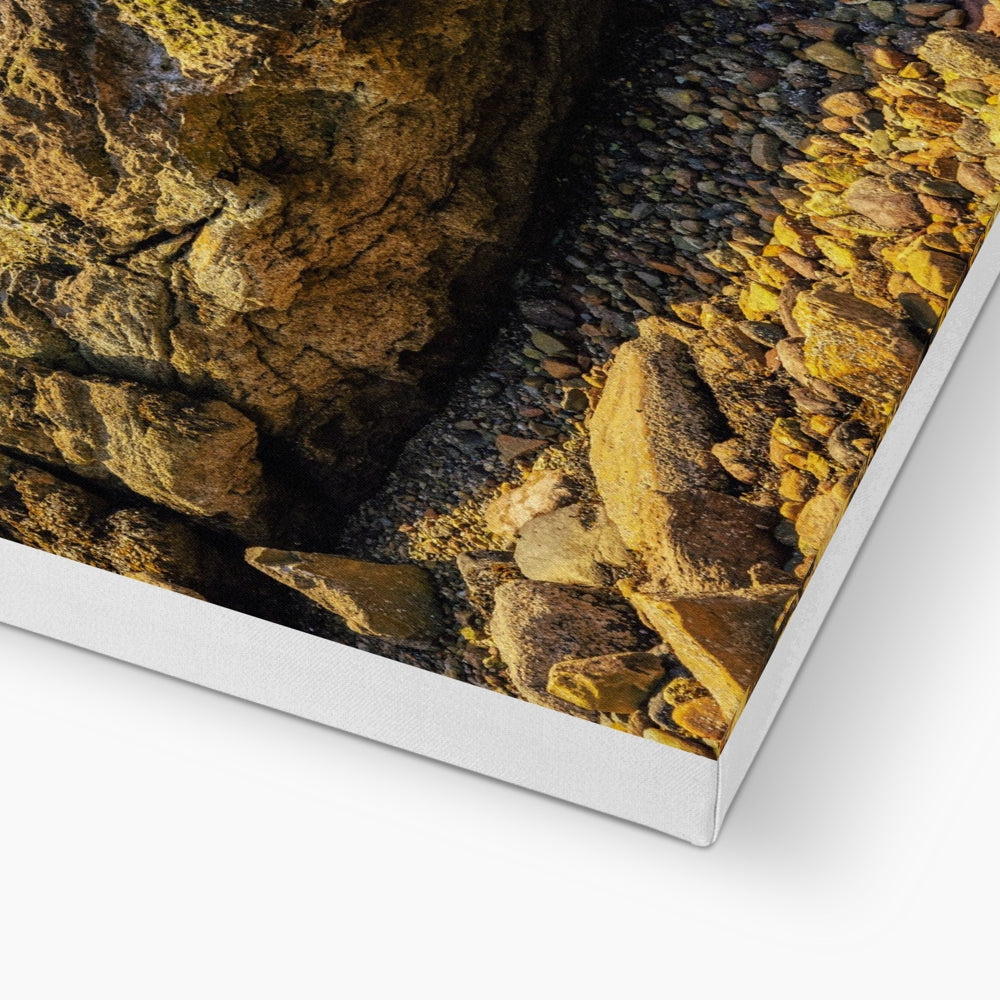 Crocodile Rock Millport canvas print of rocky beach with pebbles