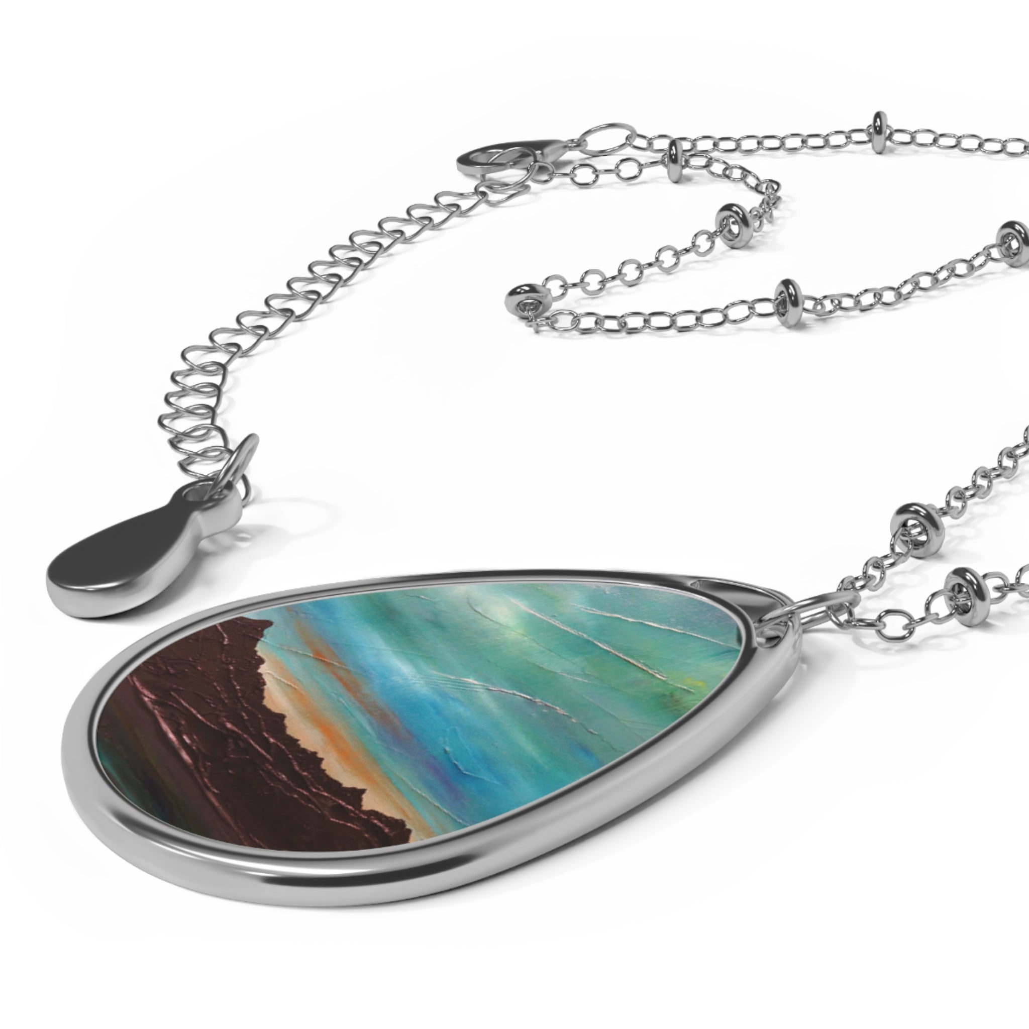 Silver chain necklace with tear-drop pendant featuring colorful abstract design from The Cuillin From Elgol Skye Scottish Art Jewellery