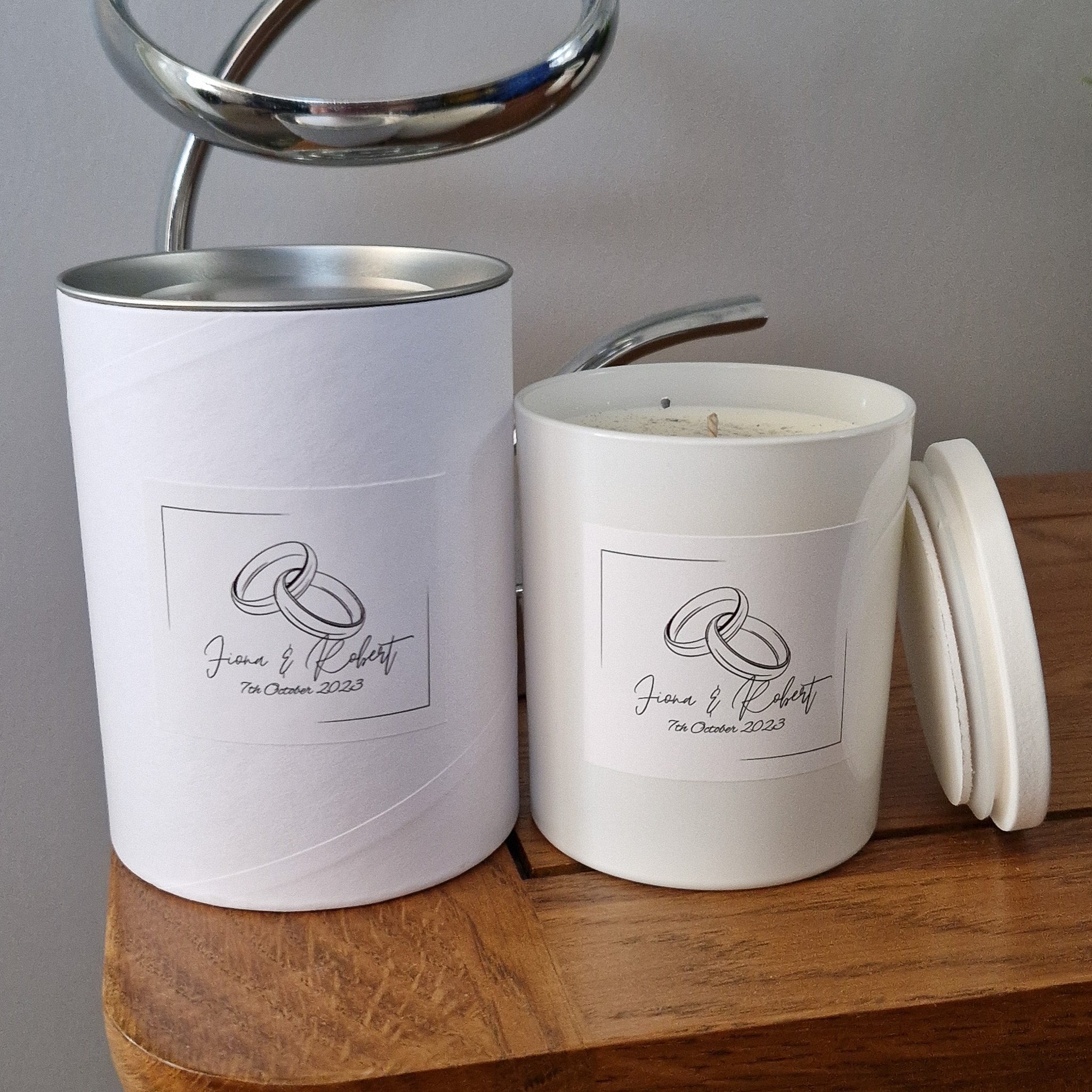 Custom large wedding candle in white jar with Jian & Robert interlocking rings label, Oct 7, 2023
