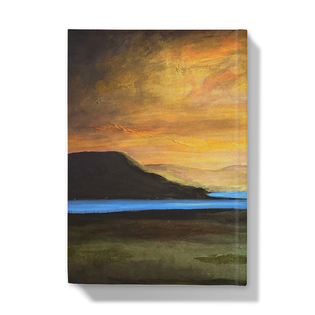 Castle Stalker Glow Hardback Journal with orange sky landscape