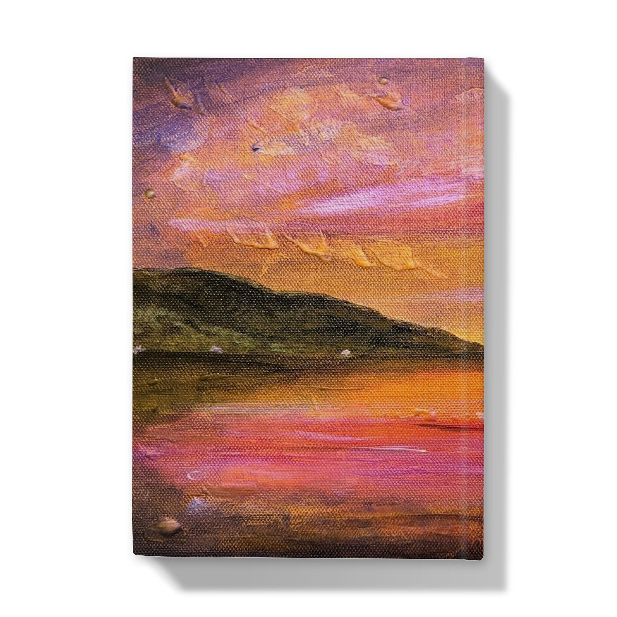 Dawn Breaks Over Loch Ness journal cover with vibrant sunset painting