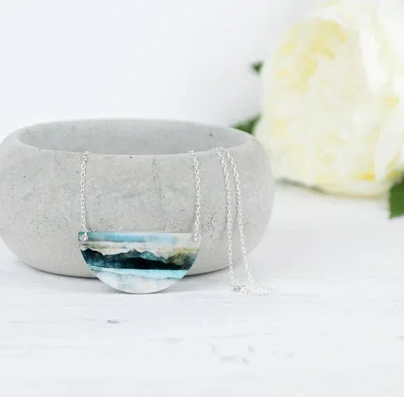 Skye from Bealach Necklace: silver chain with semi-circular landscape pendant