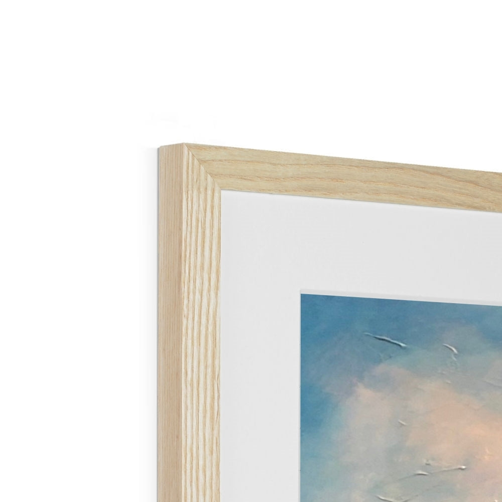 Light wood picture frame with white mat showcasing Dunnottar Castle mounted print