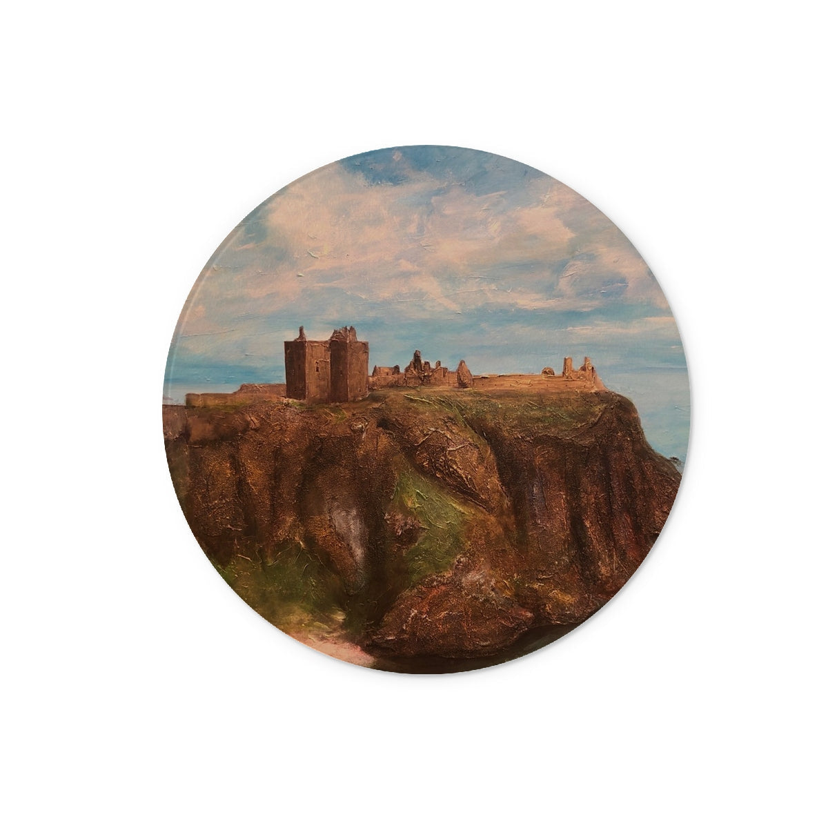 Painting of Dunnottar Castle on a cliff displayed on a glass chopping board