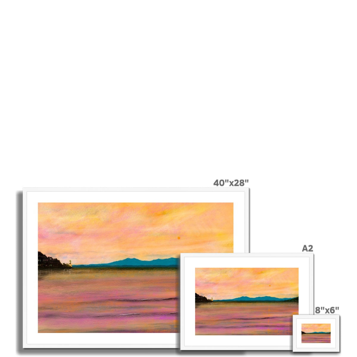 Three framed landscape prints of varying sizes from Dusk Over Arran & The Cloch collection