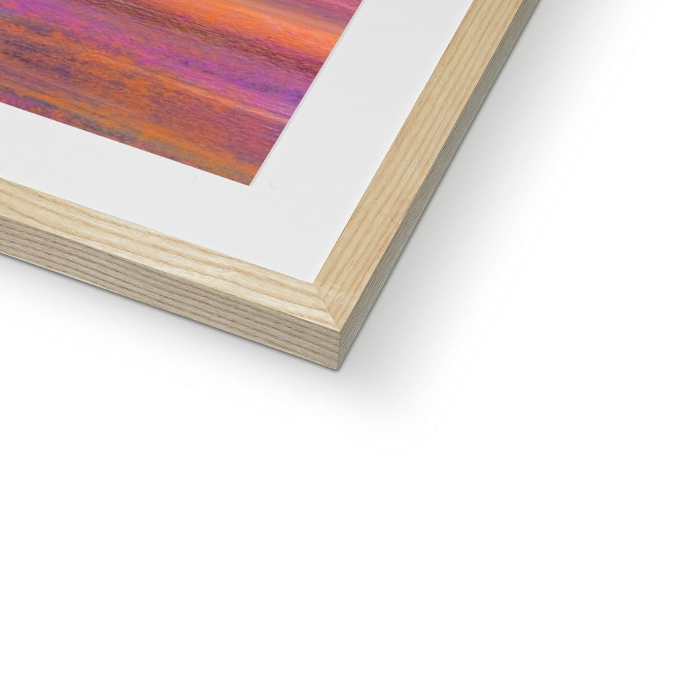 Framed Dusk Over Arran and The Cloch print with white mat and light wood frame