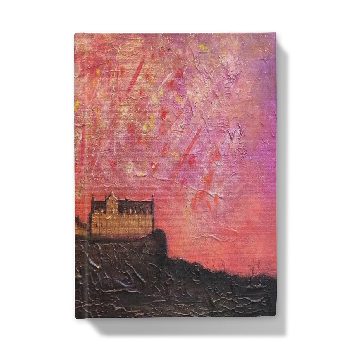 Textured painting of Edinburgh Castle on a hill under a vibrant pink and purple sky for Edinburgh Castle Fireworks Hardback Journal