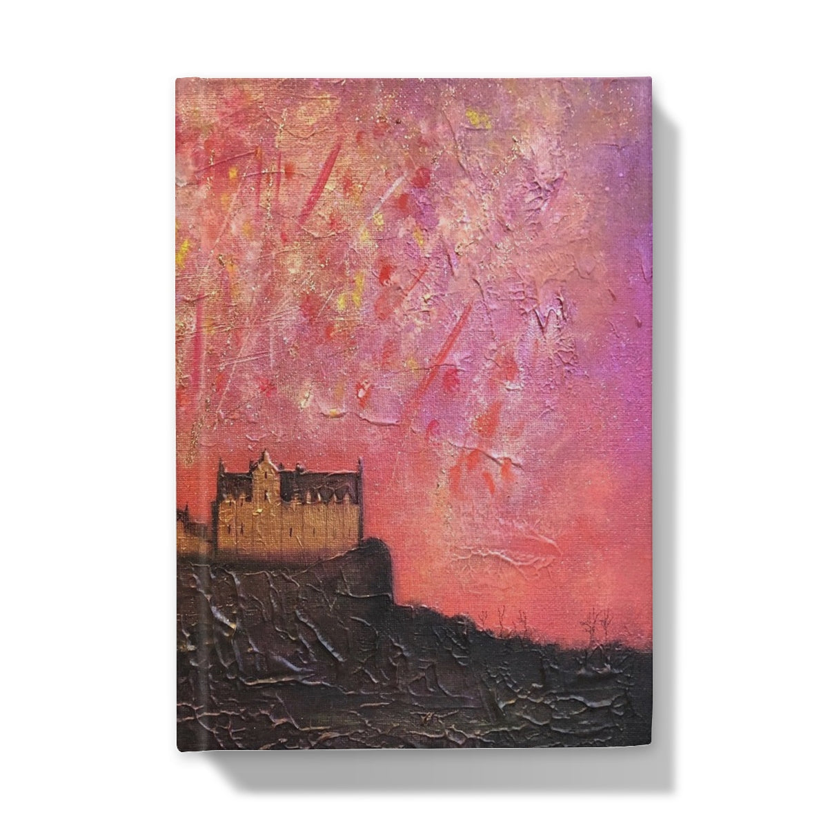 Textured painting of Edinburgh Castle on a cliff with vibrant pink and purple sky for journal cover