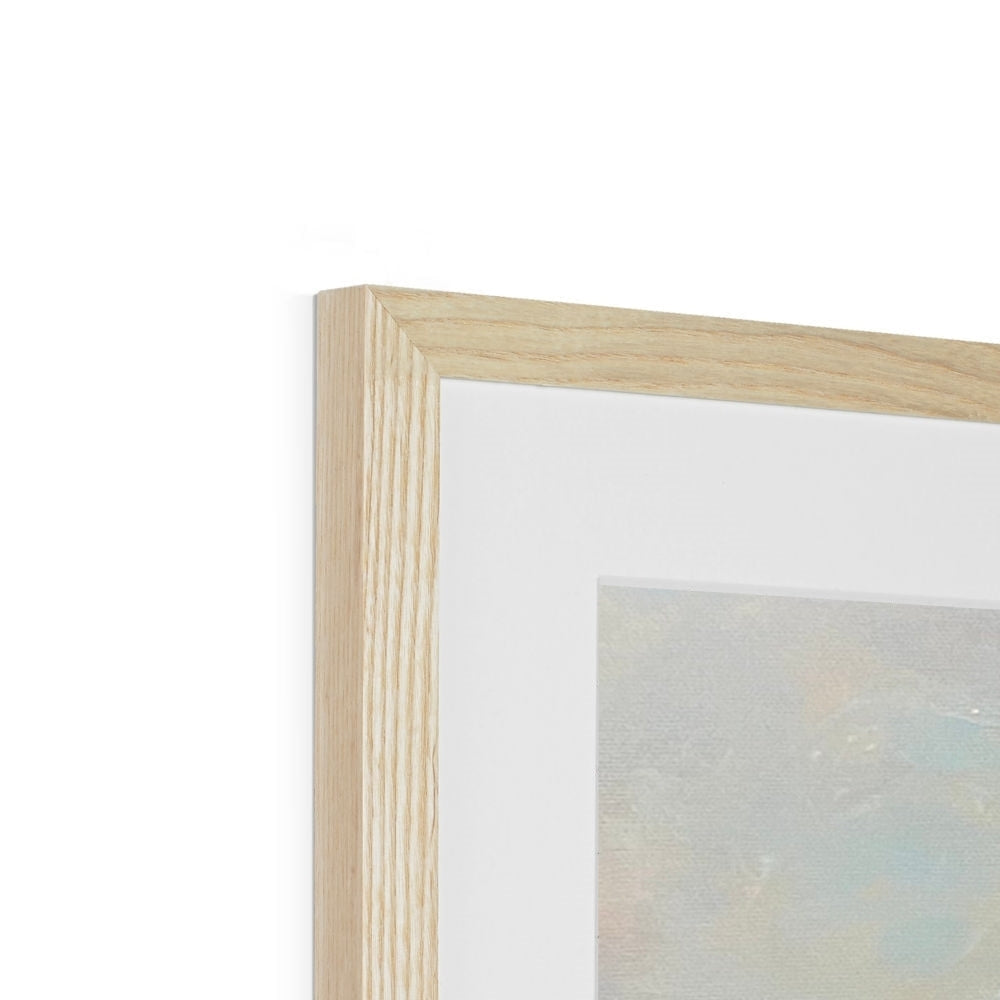 Light wood-framed Eilean Donan Castle mounted print with white mat display