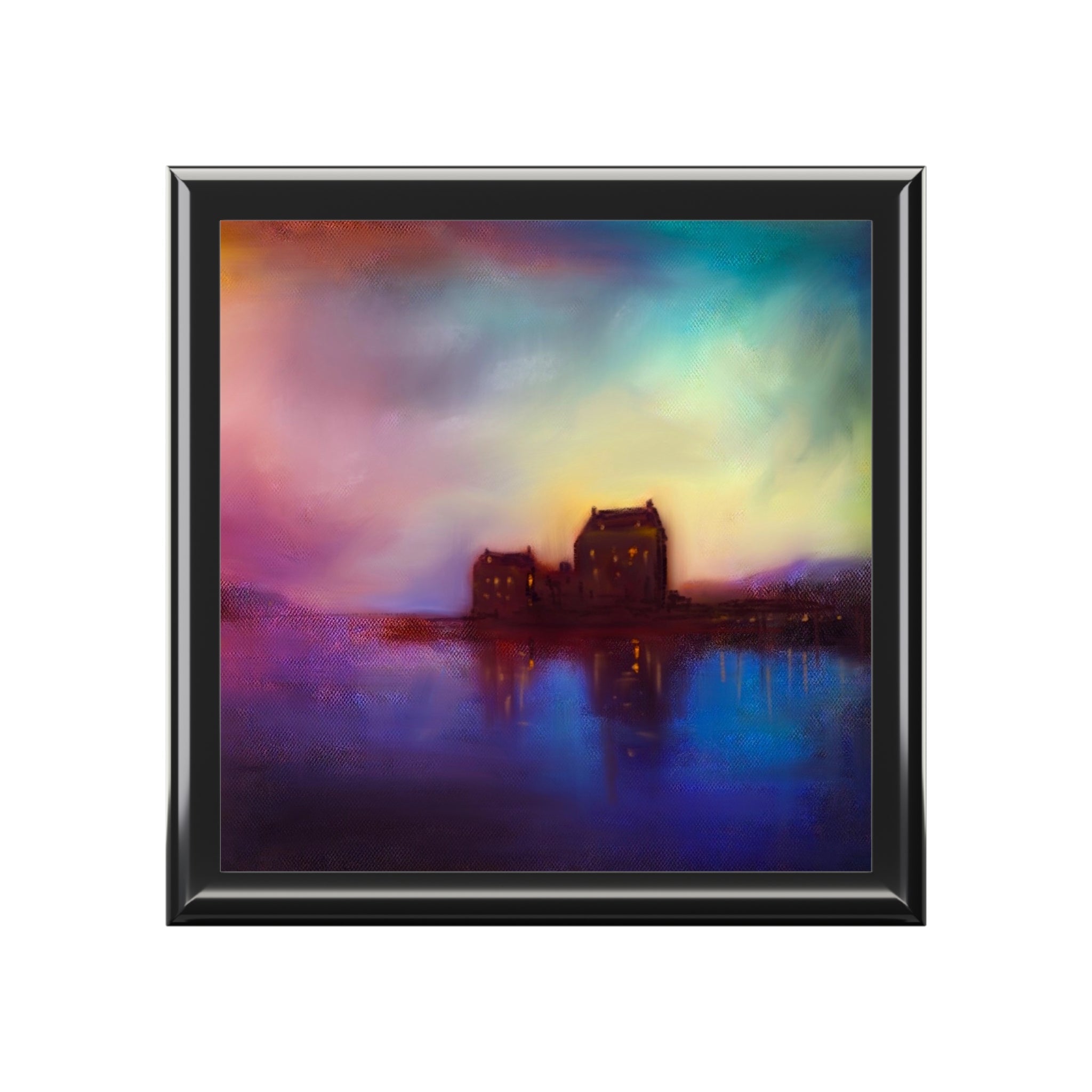 Vibrant framed painting of Eilean Donan Castle at sunset on a Scotland jewelry box