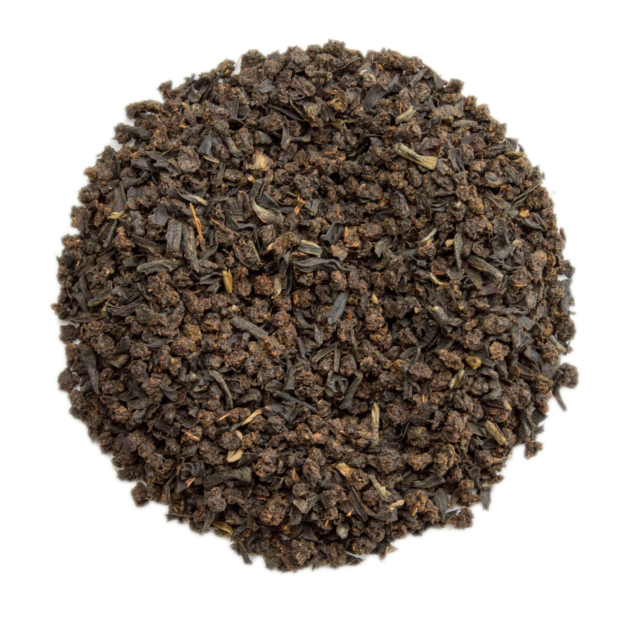 Breakfast Blend Tea pile of dark crumbled black leaves with brown green hints