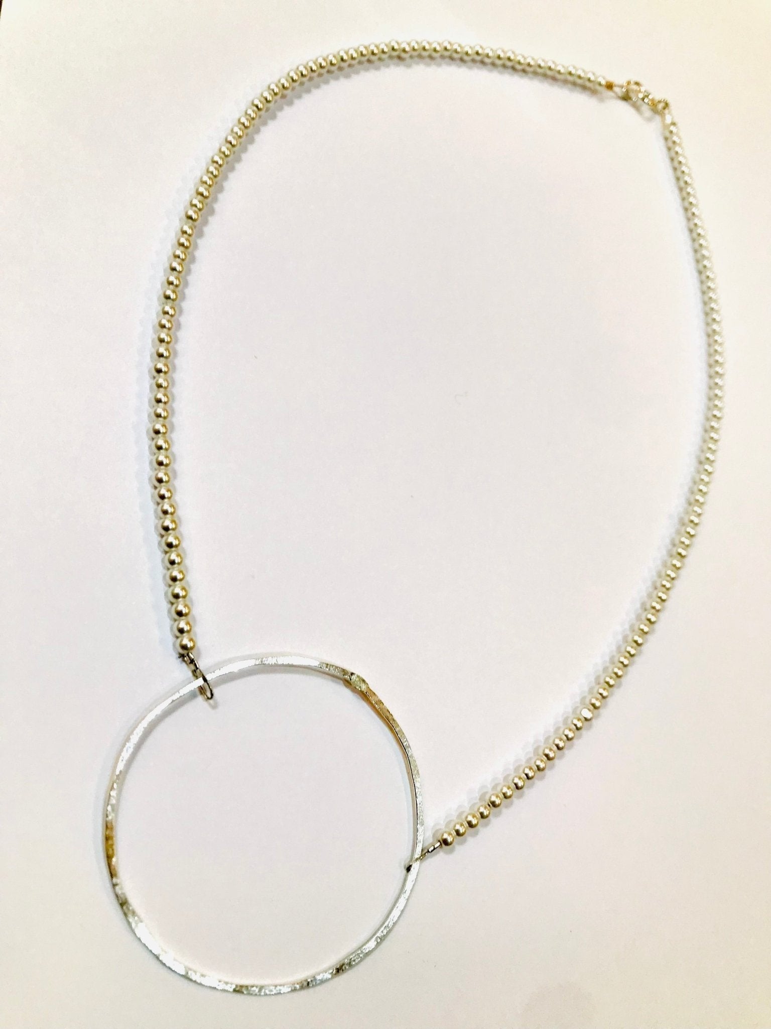 Silver hammered circle pendant necklace with beaded chain