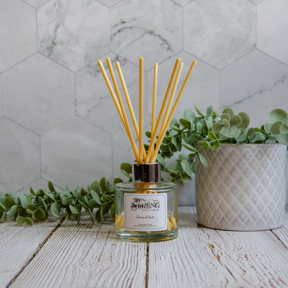 Fairy Dust 100ml diffuser by The Stirling Candle Company with yellow reeds