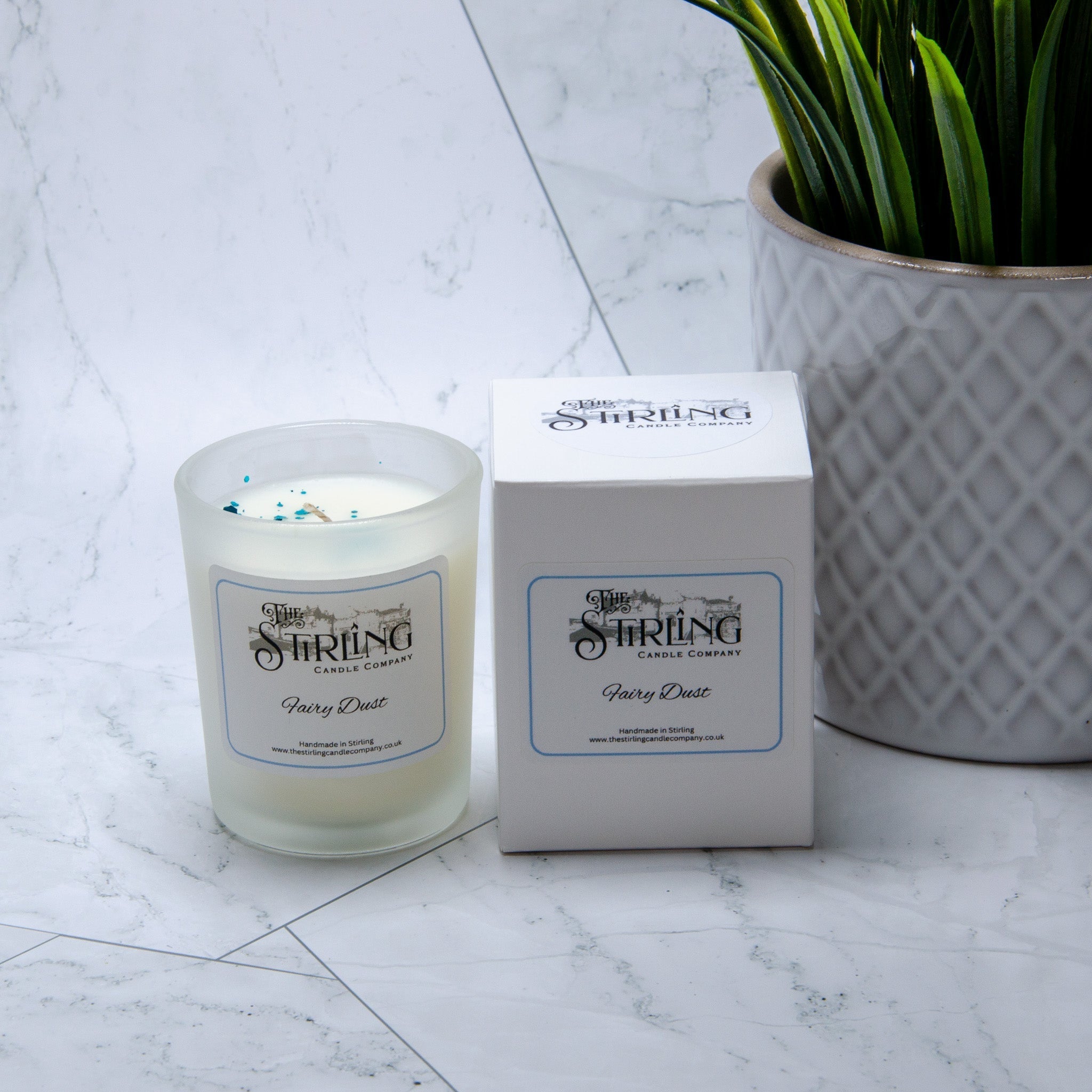 Fairy Dust small candle in frosted glass jar with white wax and blue glitter flecks by Stirling Candle Company