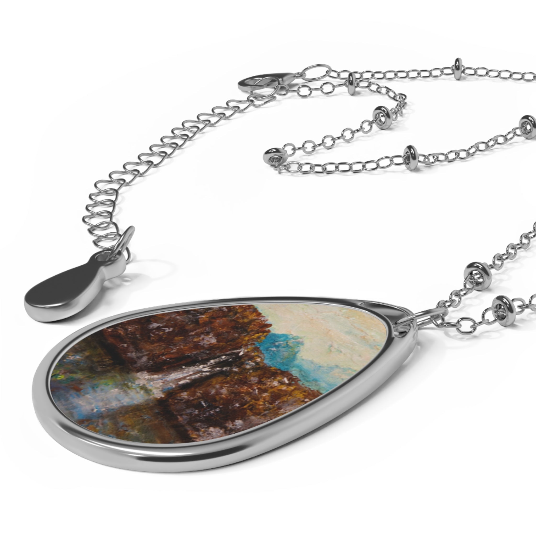 Silver teardrop pendant necklace with abstract waterfall painting from The Fairy Pools Skye Scottish Jewellery
