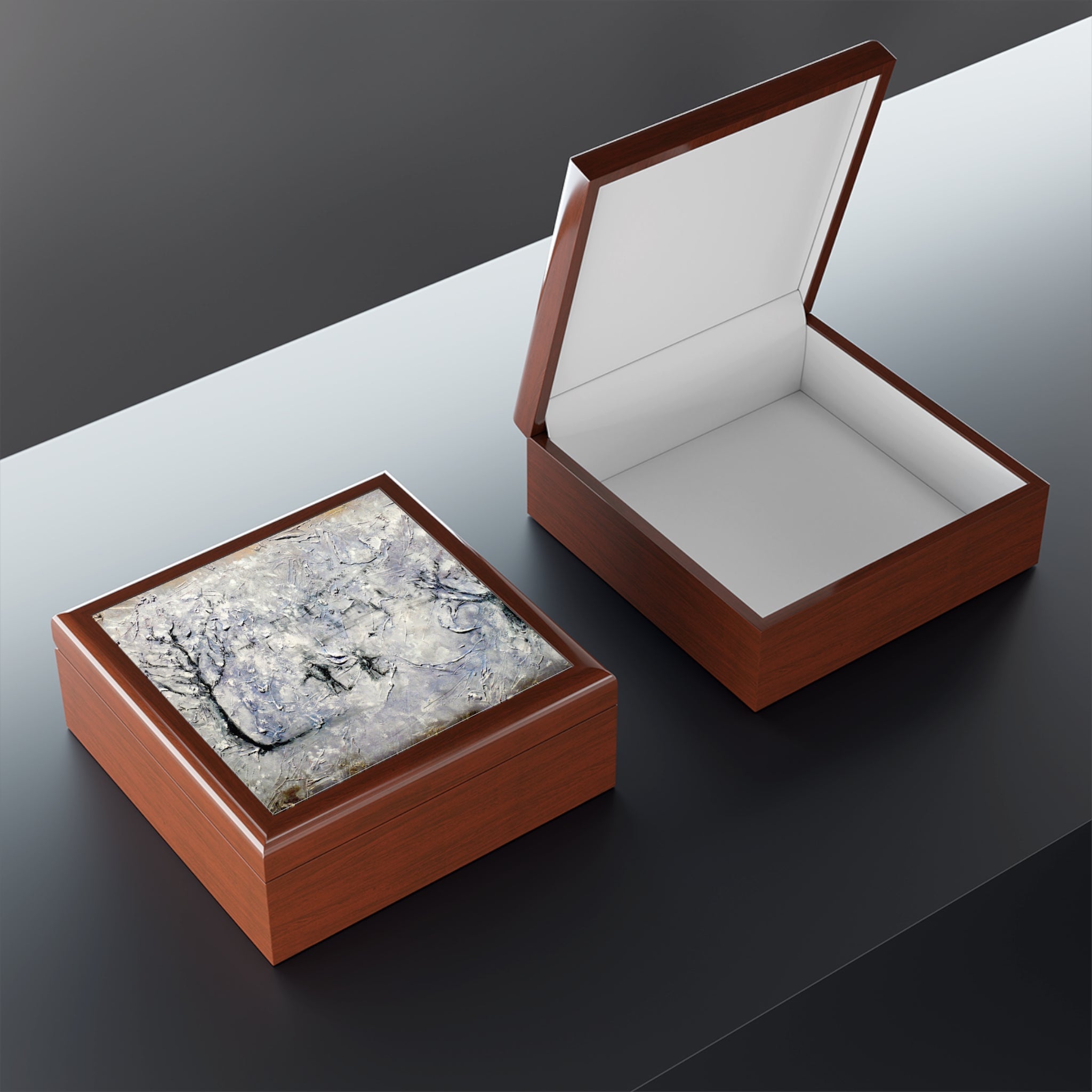 Brown wooden keepsake boxes with white abstract art design on lid in Scotland
