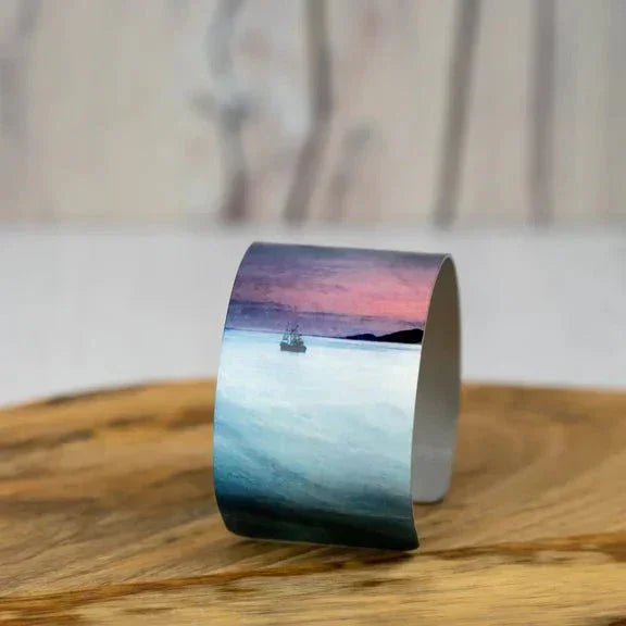 Sleek Fishing the Minch bangle by Cath Waters with sunset and boat print