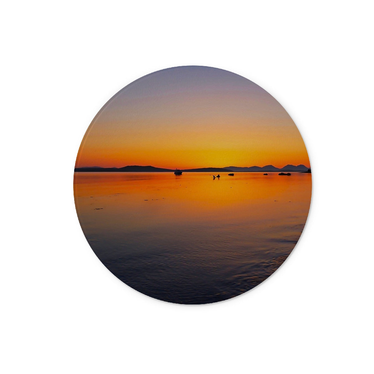 Gigha & Jura sunset glass chopping board with vibrant circular ocean view