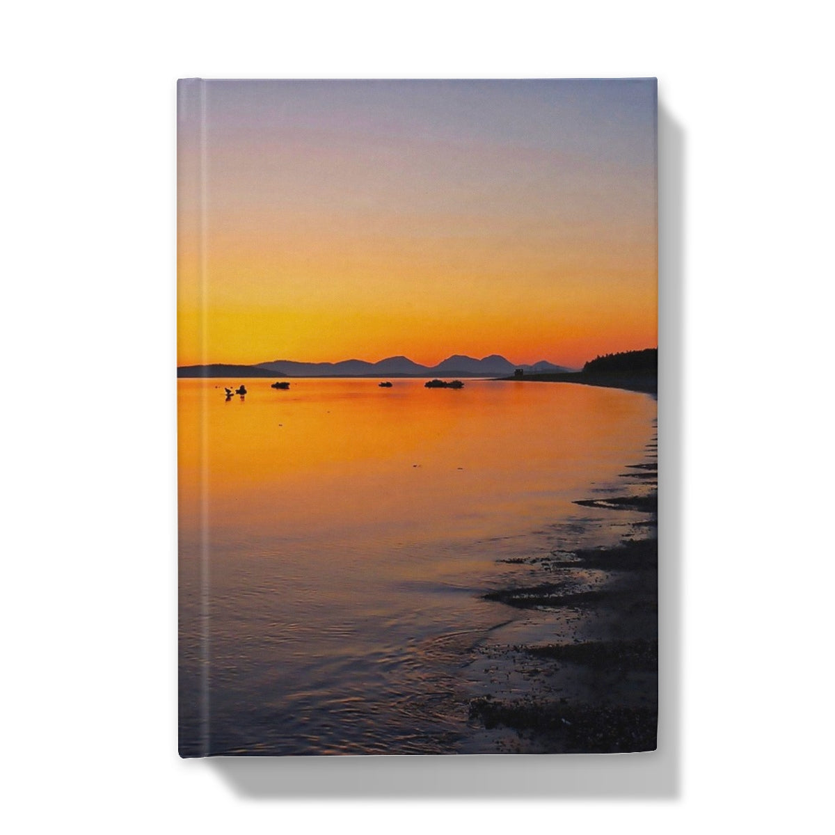 Silver 2019 MacBook Pro with Touch Bar on Gigha & Jura Sunset Journal