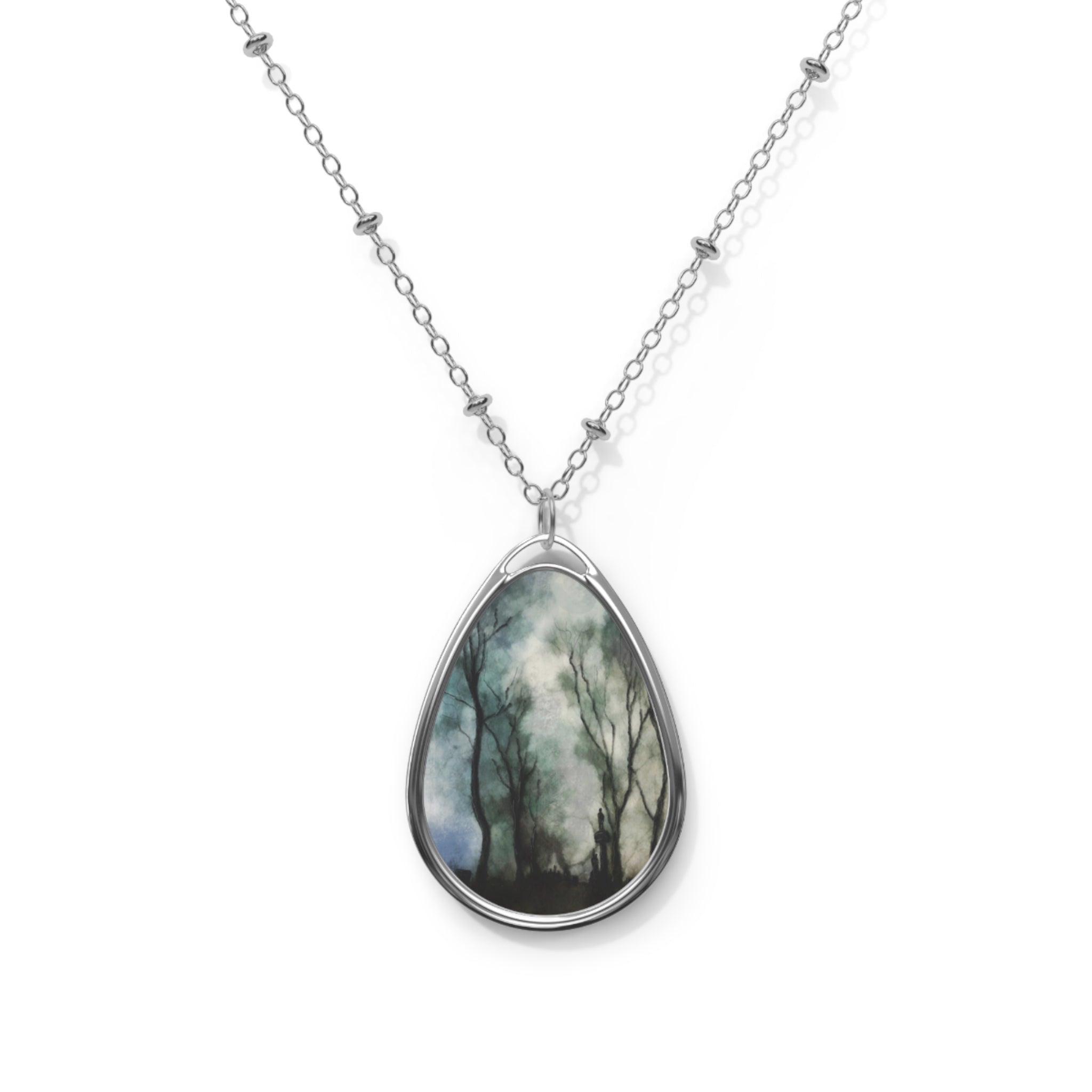 Silver chain necklace with teardrop pendant featuring a painted forest scene from Glasgow Necropolis Moonlight collection