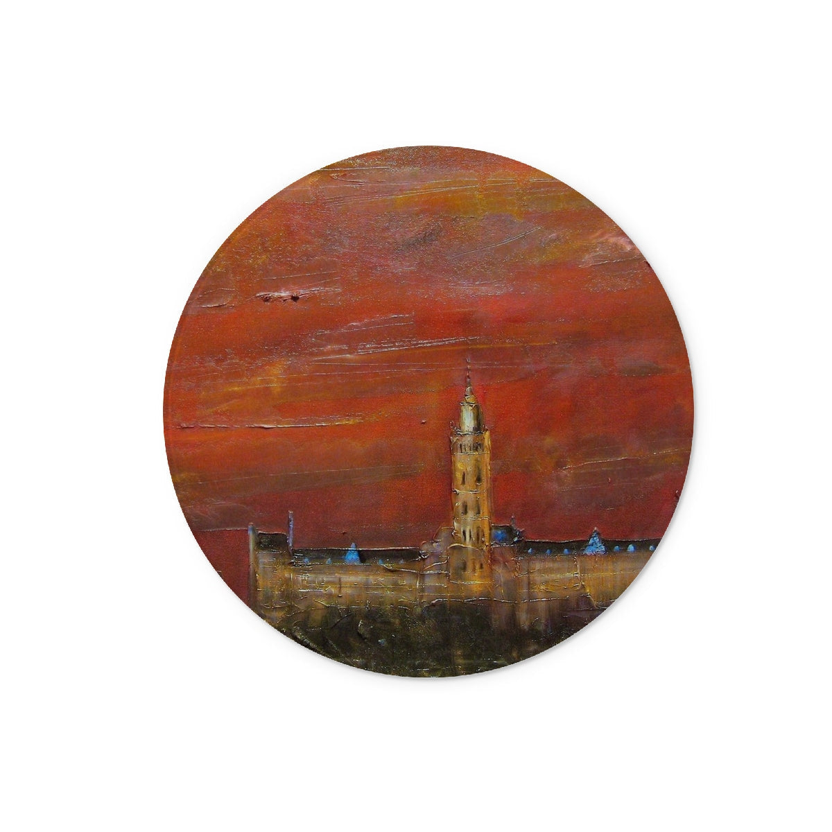 Round Glasgow University Dusk Glass Chopping Board featuring a cityscape with a prominent tower against a fiery red sky