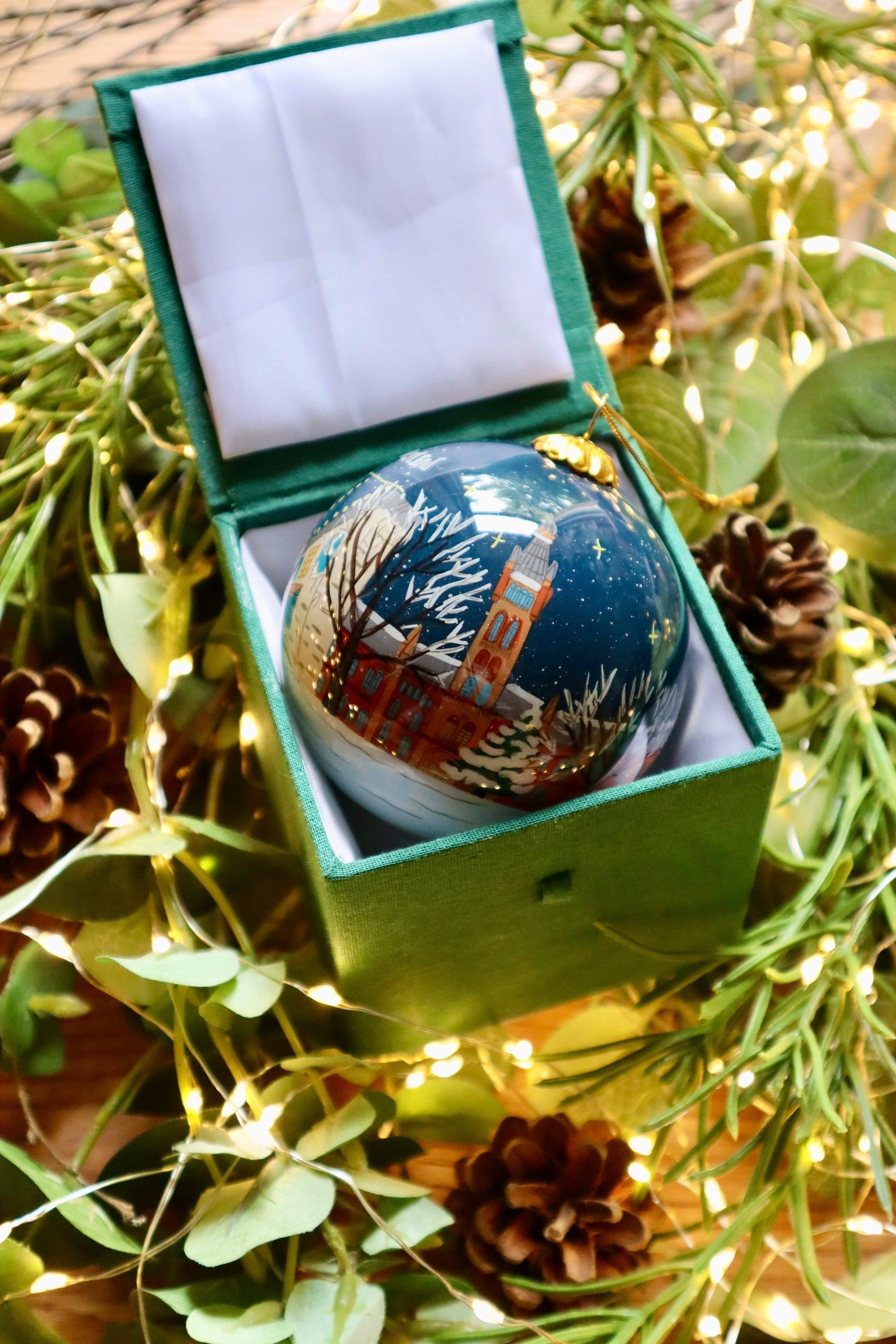Glasgow’s West End glossy blue glass Christmas bauble with winter scene in velvet box