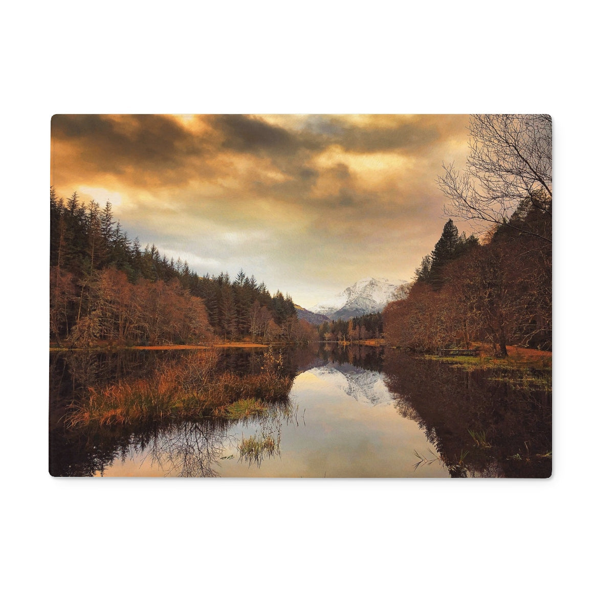 Golden sunset landscape on Glencoe Lochan Dusk glass chopping board