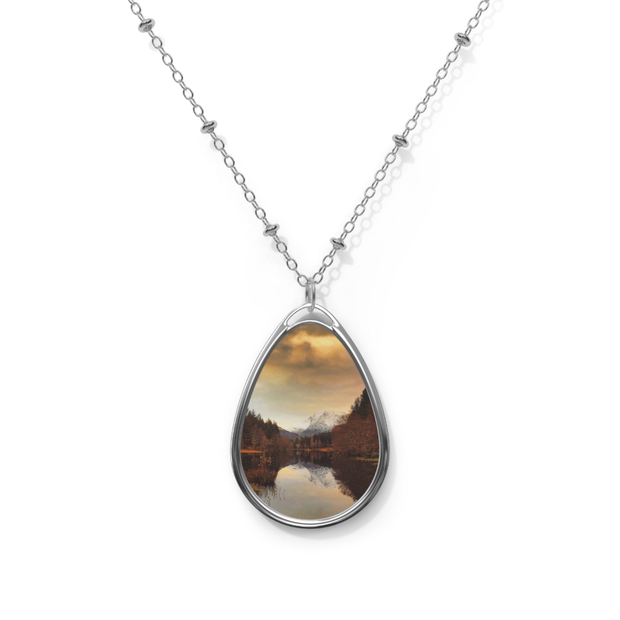 Silver chain necklace with oval nature scene pendant from Glencoe Lochan Dusk Scottish Art Jewellery