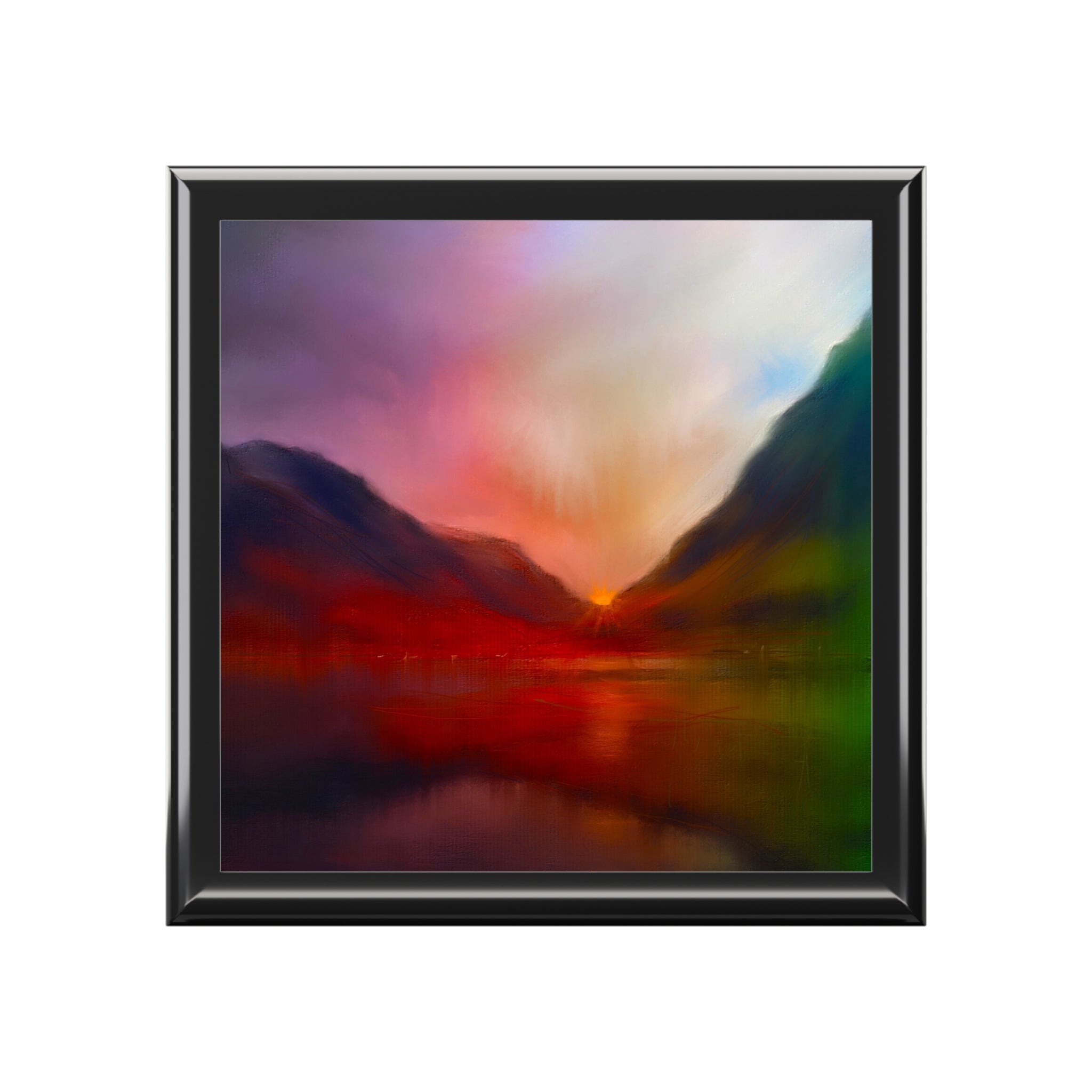 Framed vibrant sunset painting over a lake between mountains on Glencoe Sunset Jewellery Box Scotland