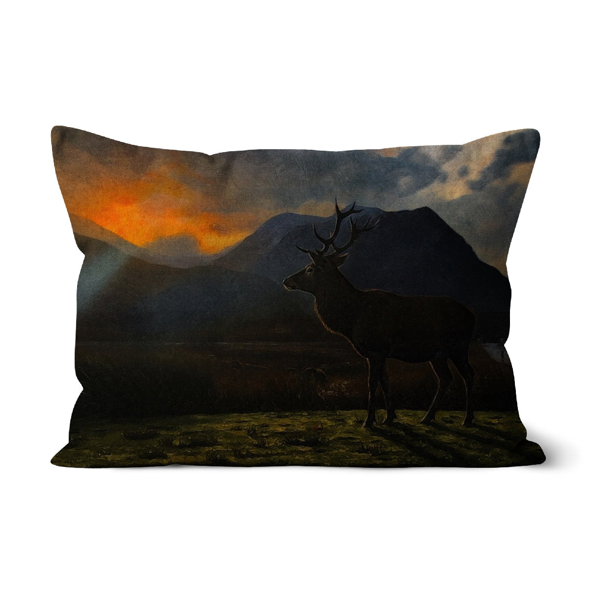 A Glencoe Sunset Stag rectangular cushion with silhouetted stag painting