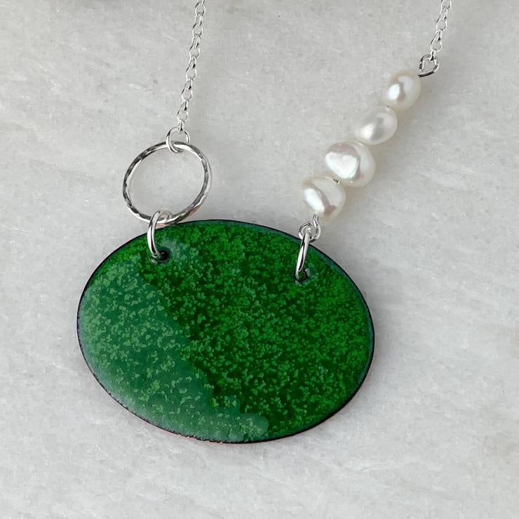 Vibrant grass green oval enamel pendant with pearls on silver chain by Lindsay Mcdowall Jewellery