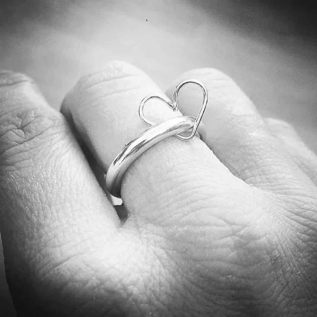Delicate silver heart charm ring by Genna Miller Jewellery