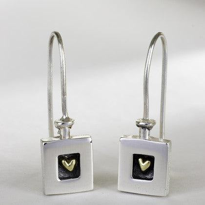 Silver square drop earrings with gold heart inset by Alan Ardiff Jewellery