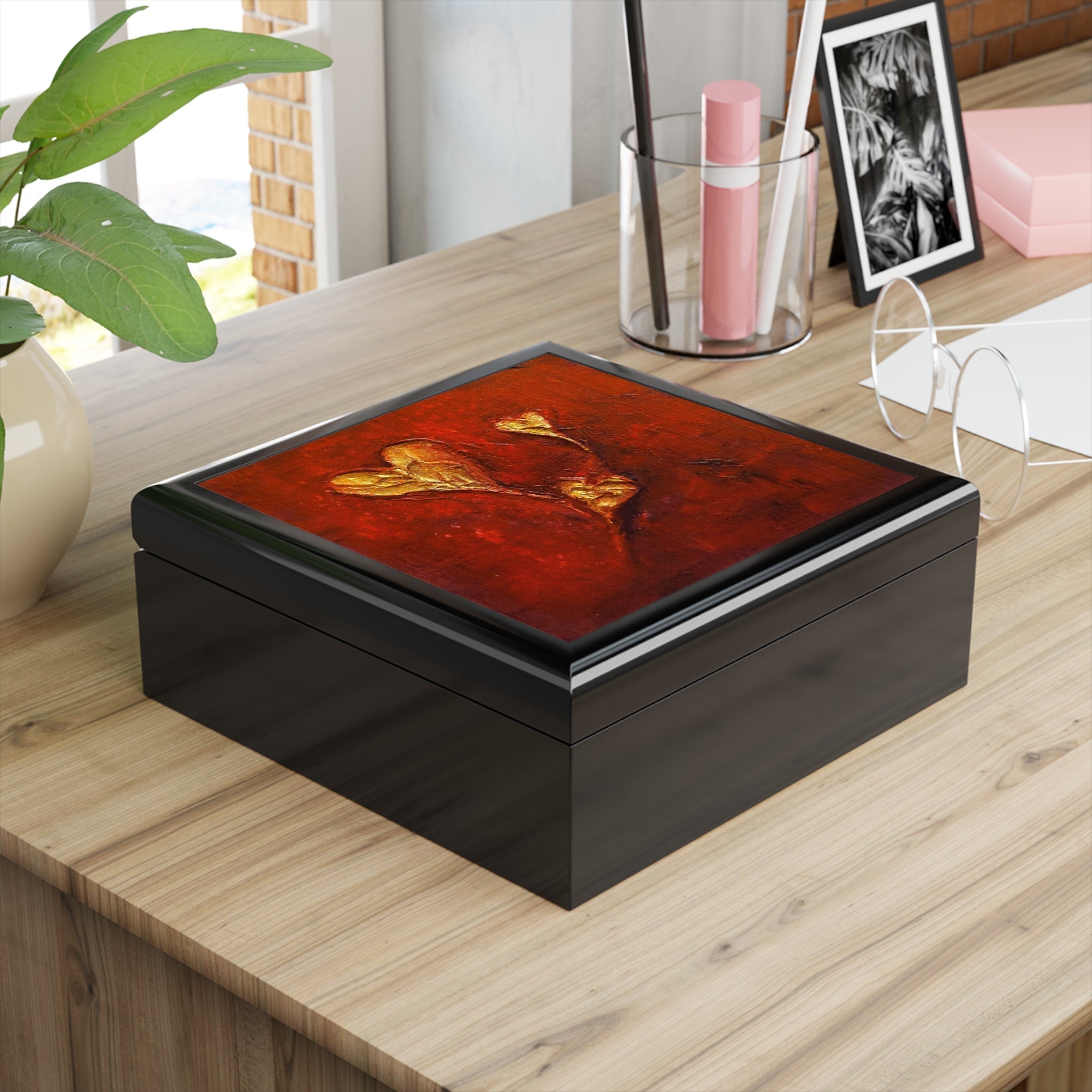 Black wooden keepsake box with vibrant red and gold abstract art lid from Hearts Art Jewellery Box Scotland