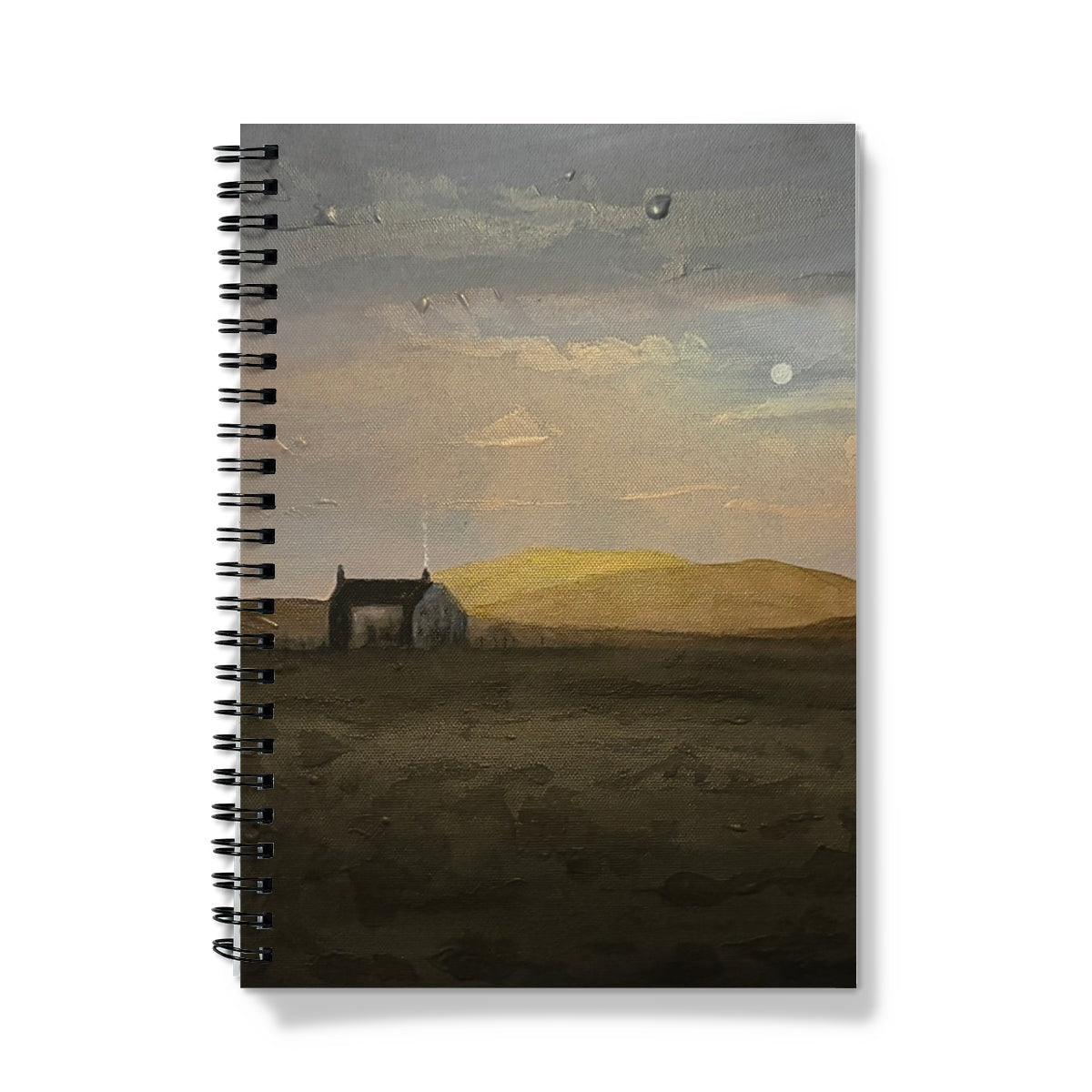 Black spiral-bound Hebridean Croft House notebook with painterly landscape of solitary house on rolling hills under cloudy sky