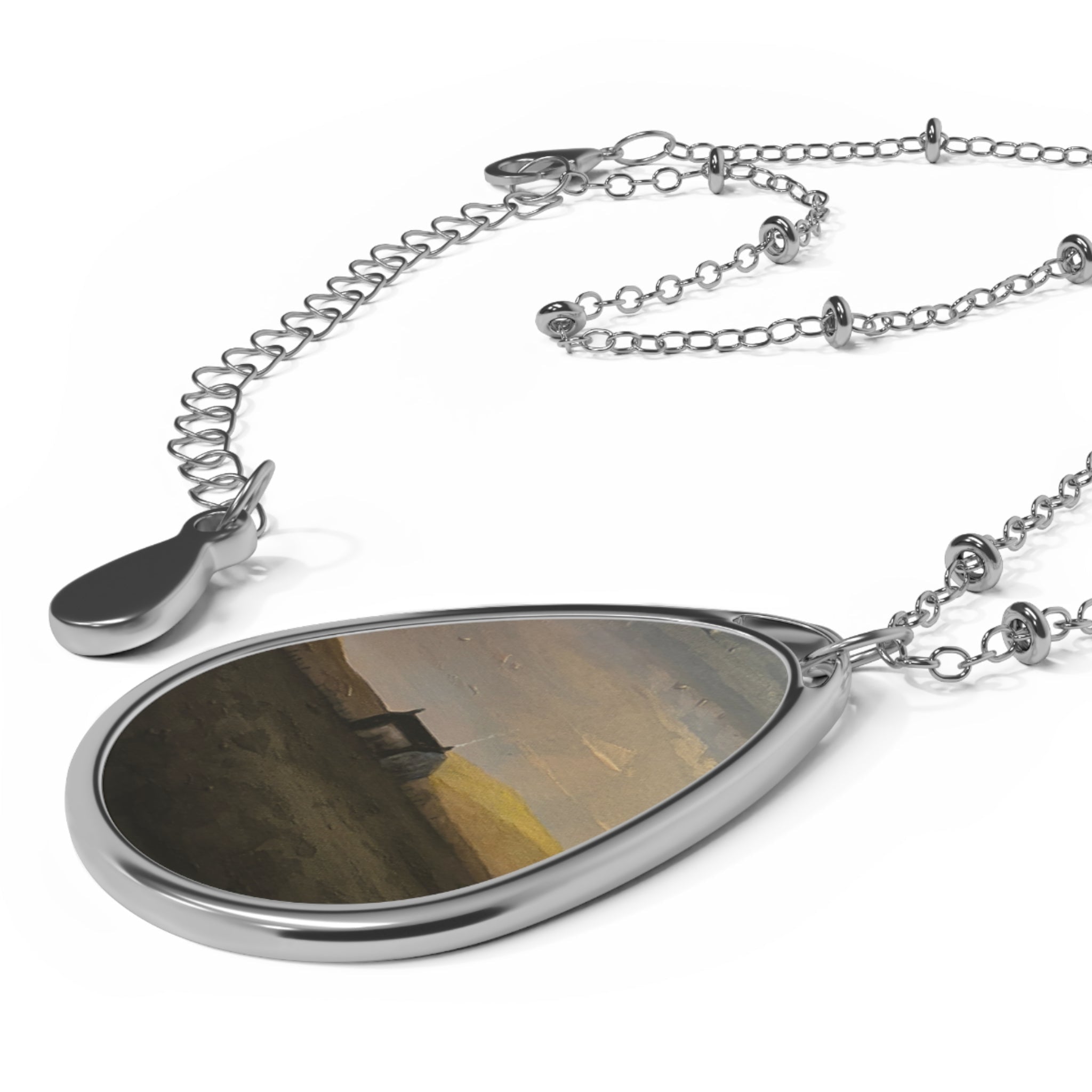 Silver teardrop pendant necklace with Hebridean croft house art