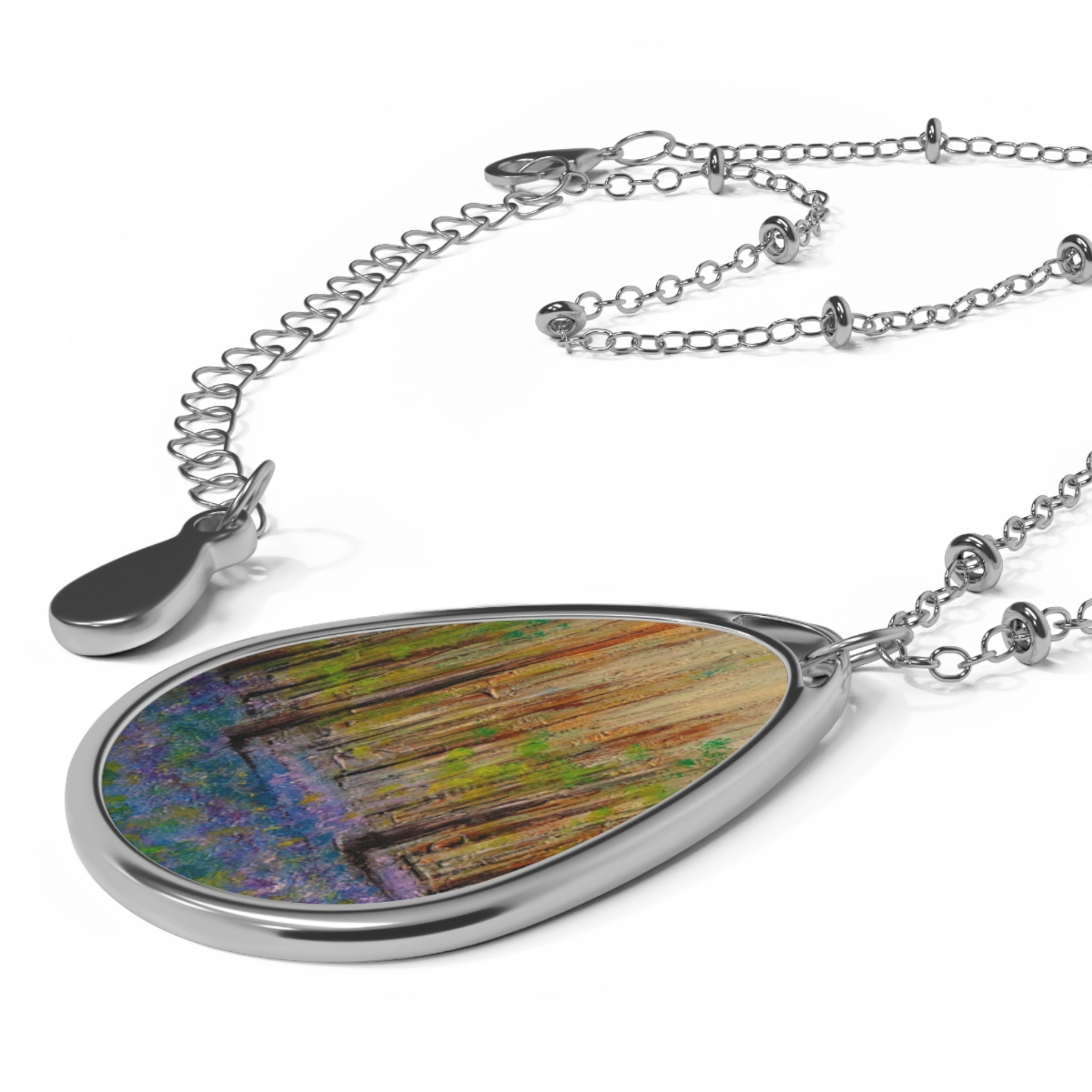 Silver-toned teardrop pendant with abstract painting on Highland Bluebells Scottish art necklace
