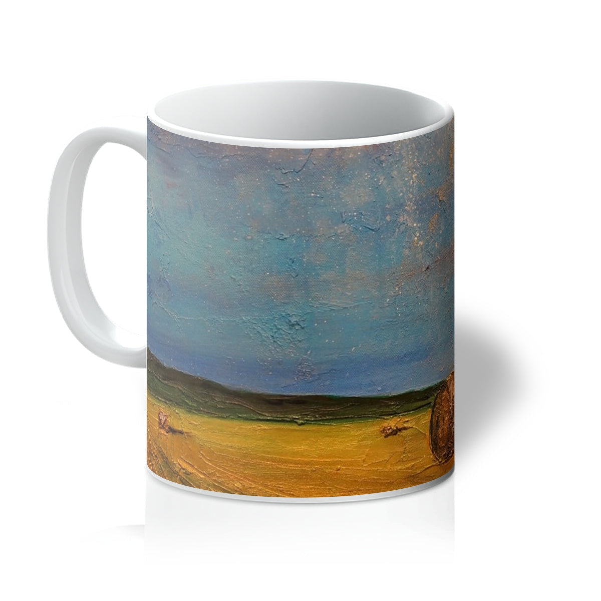 Highland Hay Bales ceramic mug with blue sky and yellow field design