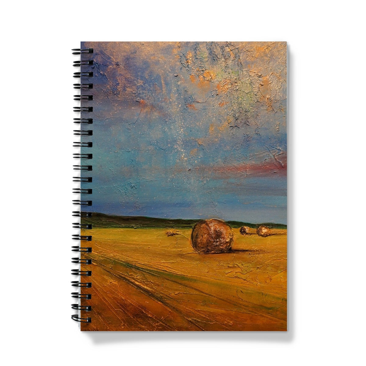 Spiral-bound Highland Hay Bales Notebook with hay bales and blue sky design