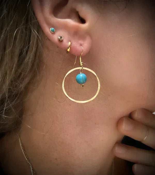 Gold hoop earring with turquoise bead from Genna Miller Jewellery