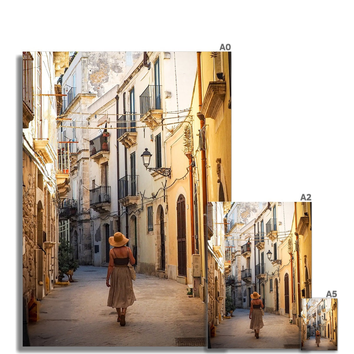 Woman in beige dress walks sunlit Ortigia alleyway, fine art print