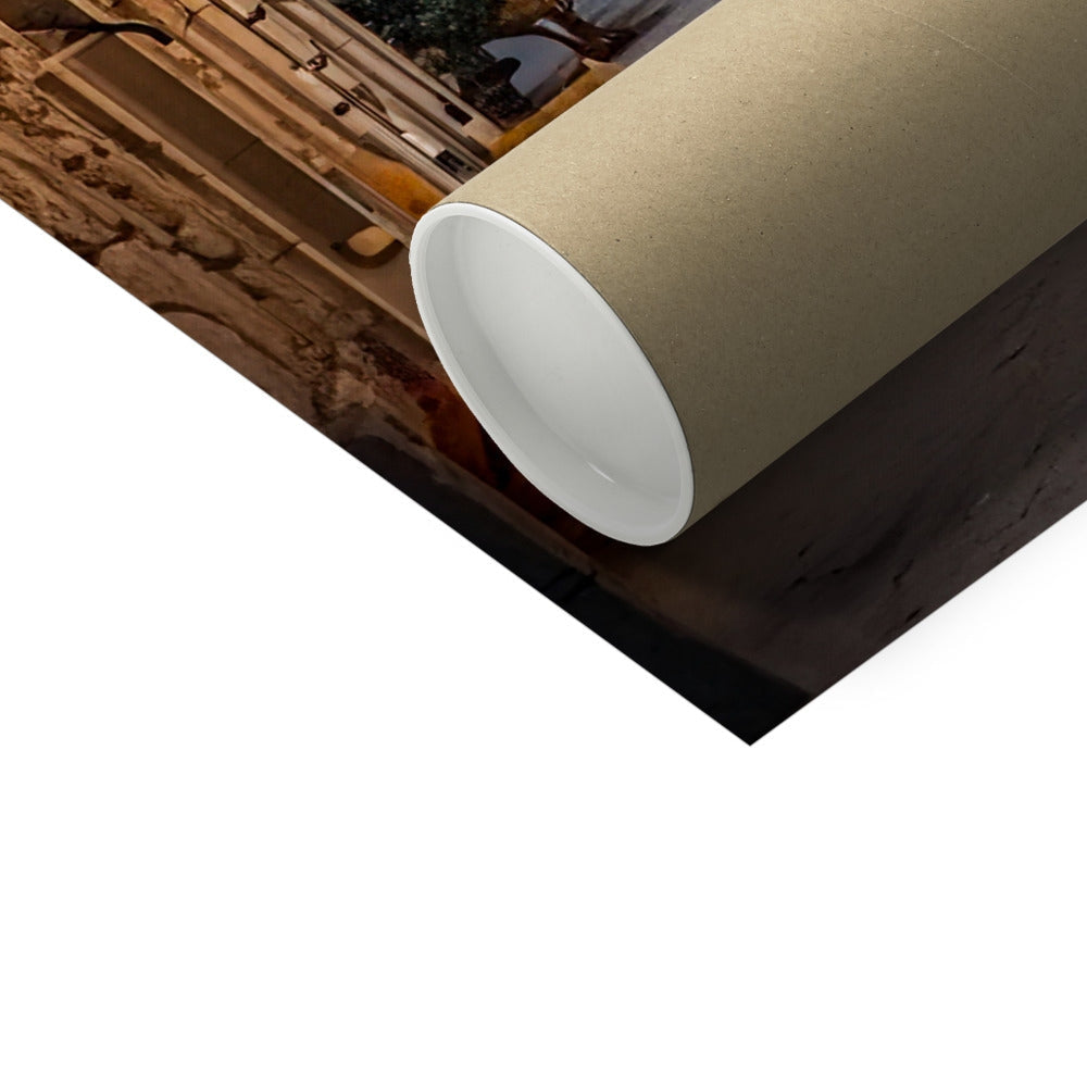 Isla de Ortigia beige cardboard tube on dark surface