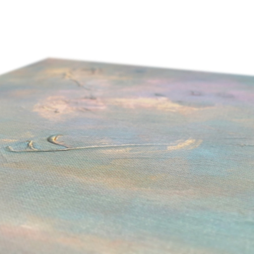 Silver spoon with long handle and curved bowl in Jura From Crinan Canvas