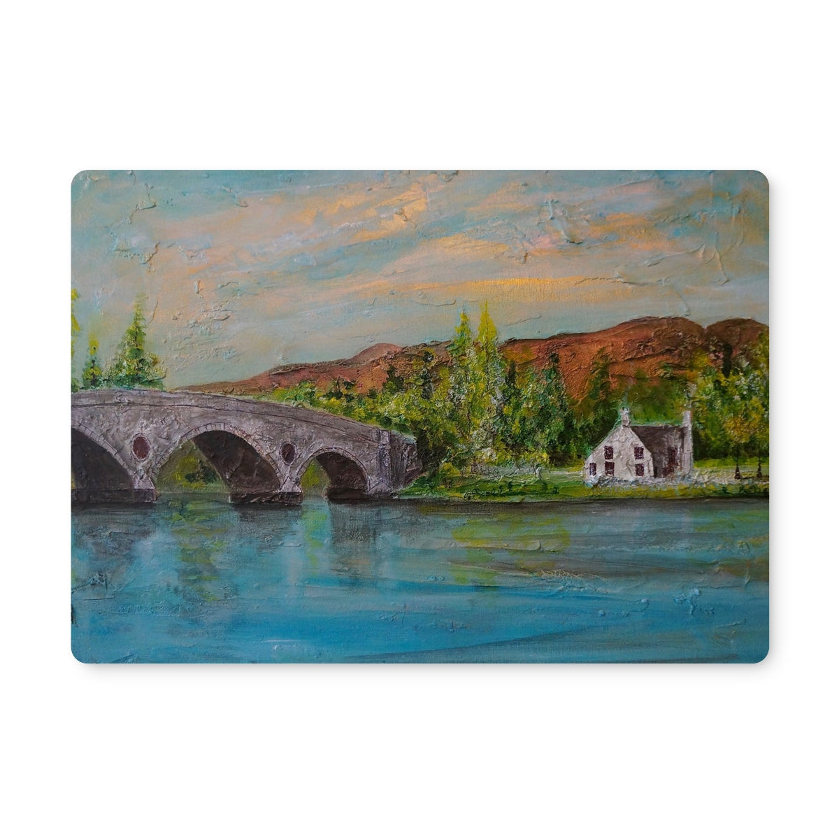 Kenmore Bridge II placemat with arched stone bridge puzzle piece and house backdrop